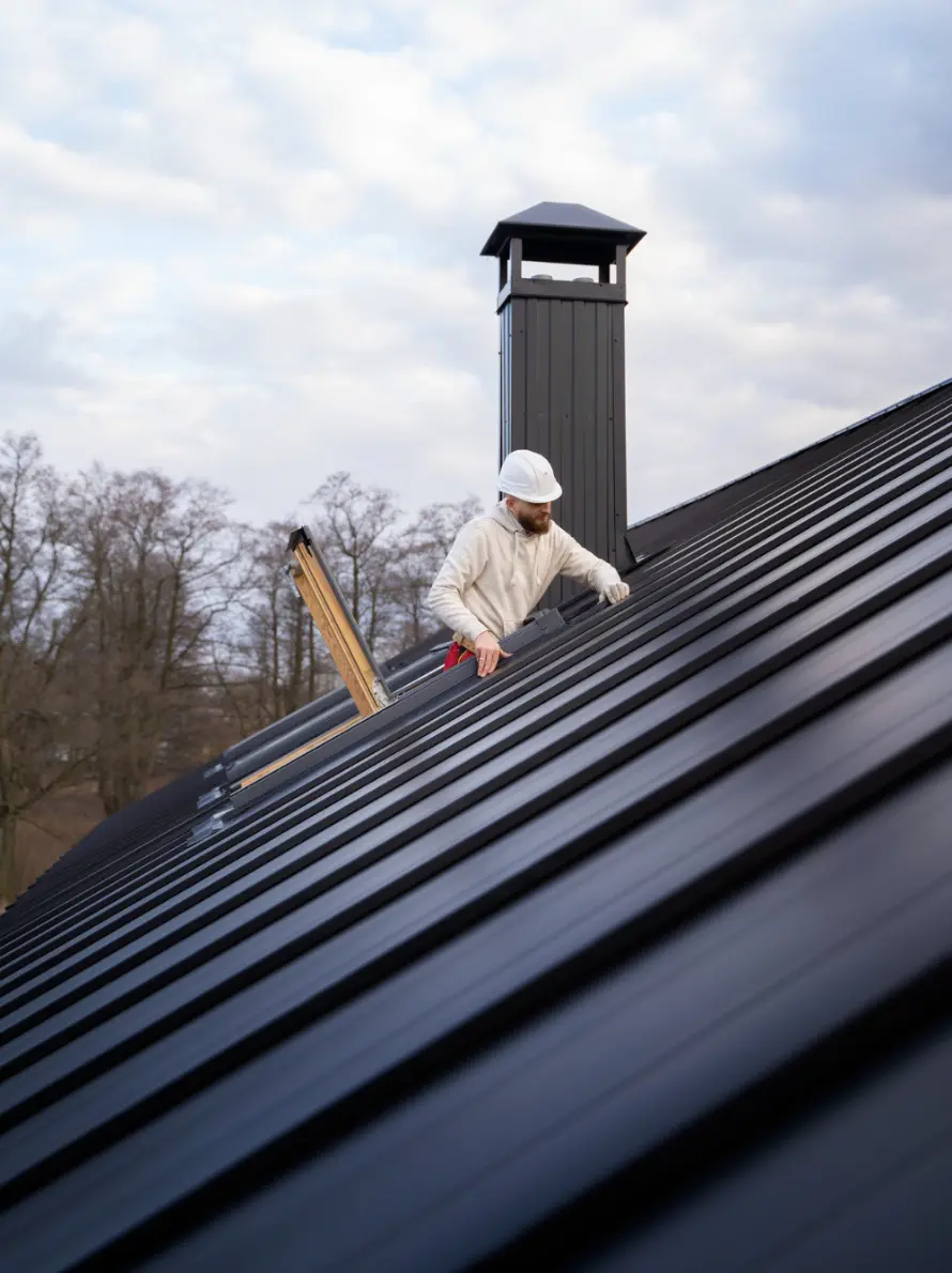 Man working on the Roof - 1