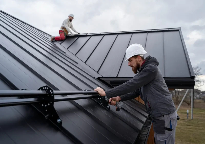 Roofing workers on the roof